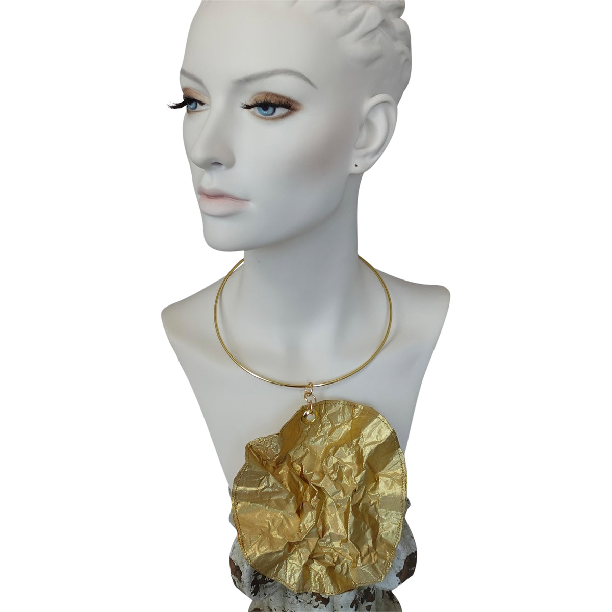 a mannequin with a necklace