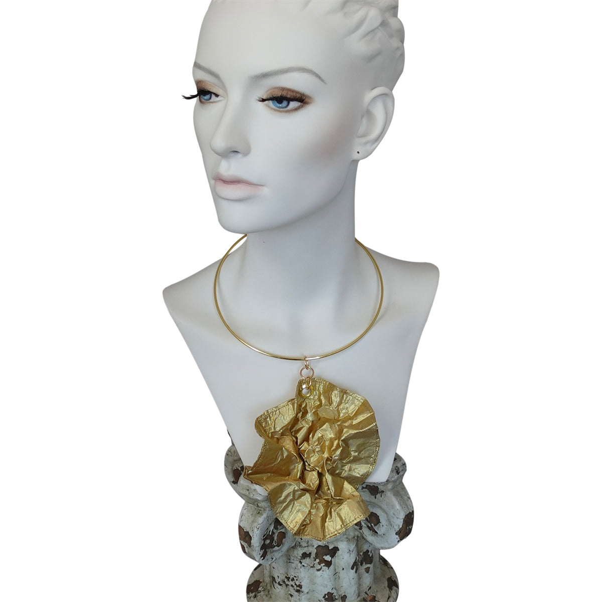a mannequin with a necklace