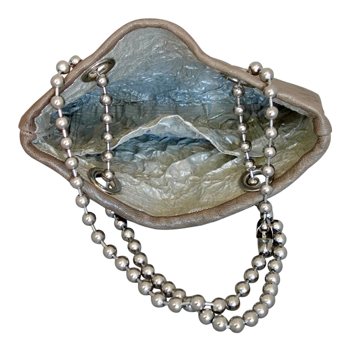 a silver chain around a purse