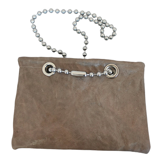 a brown purse with silver beads