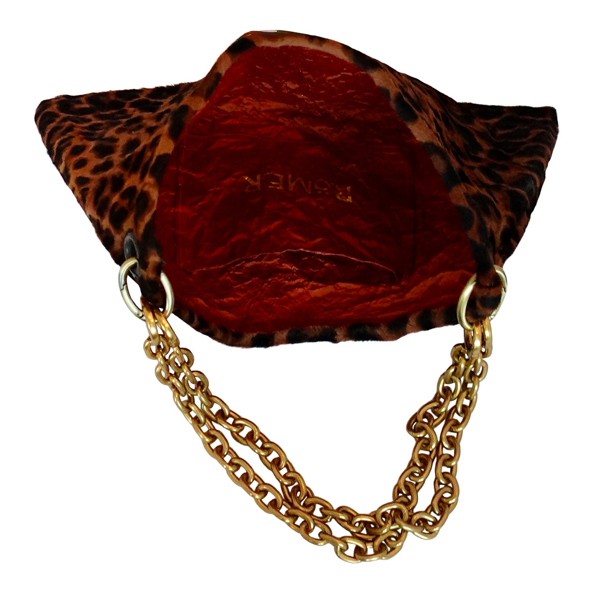 a leopard print purse with a gold chain