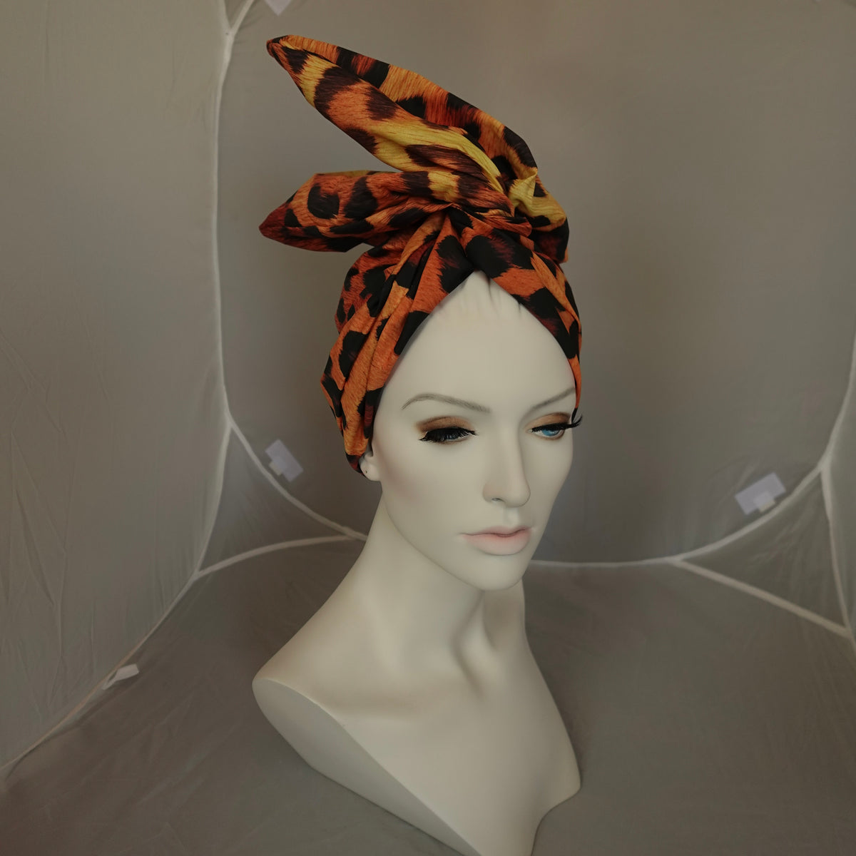 a mannequin with a head wrap