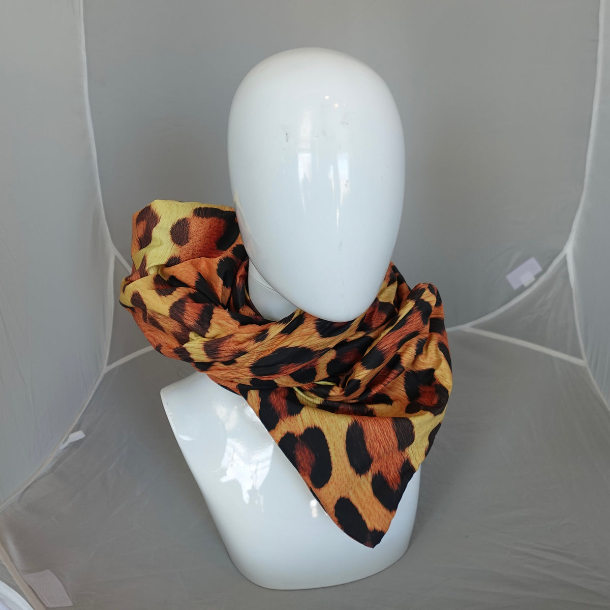 a mannequin wearing a scarf