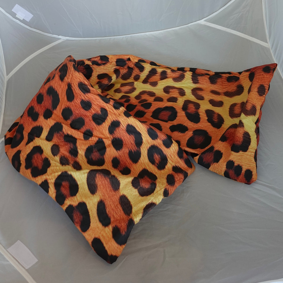 a pillow on a white net