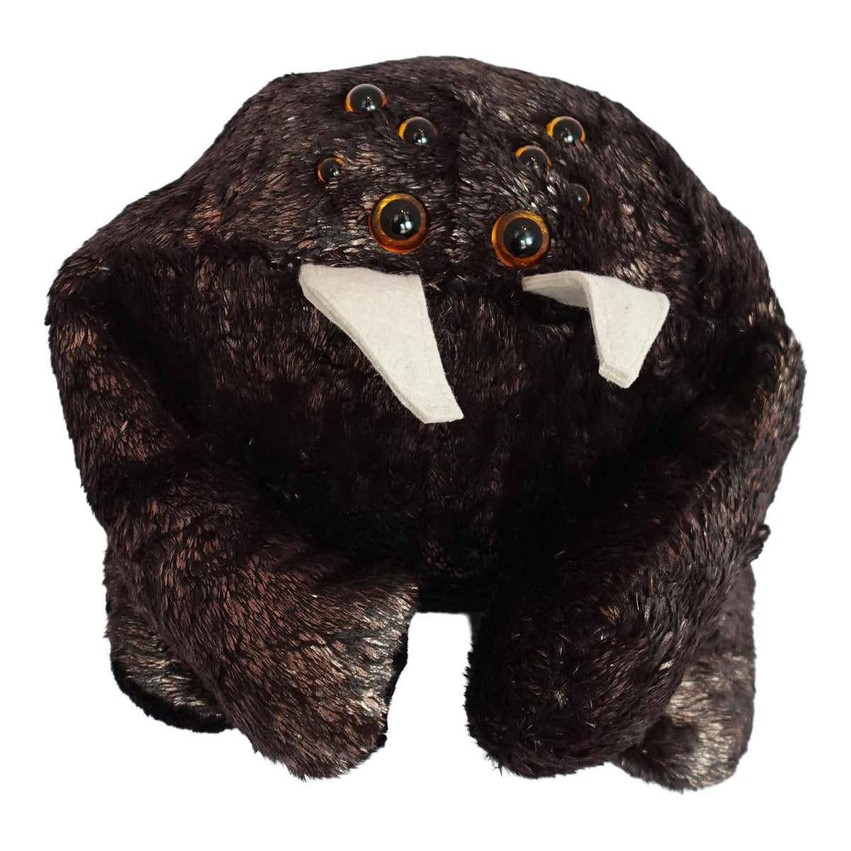 a stuffed animal with big eyes