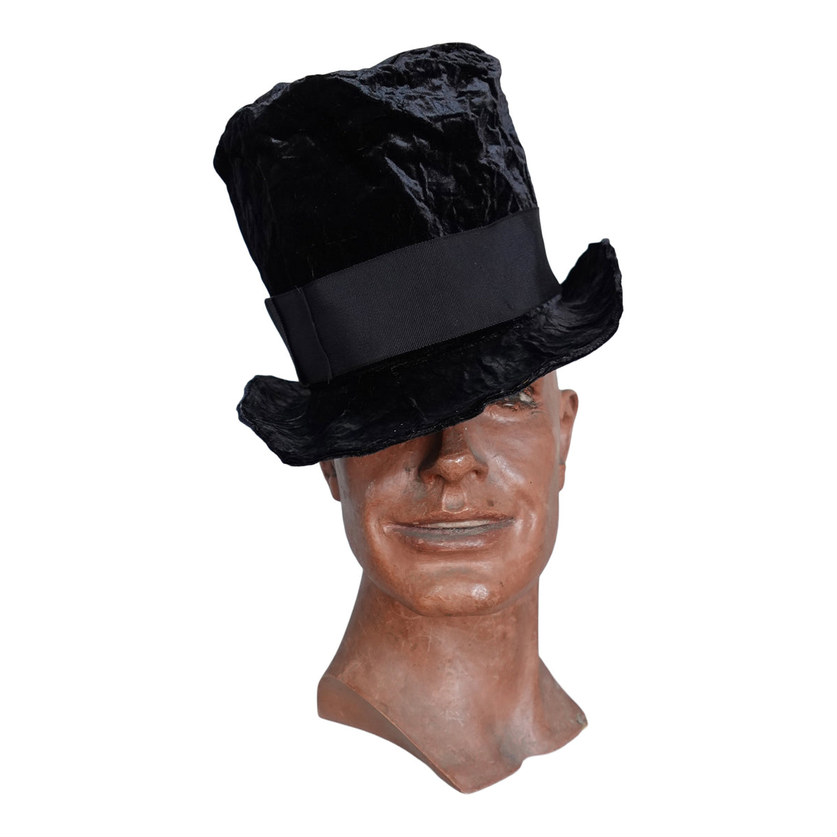 a mannequin head with a black top hat
