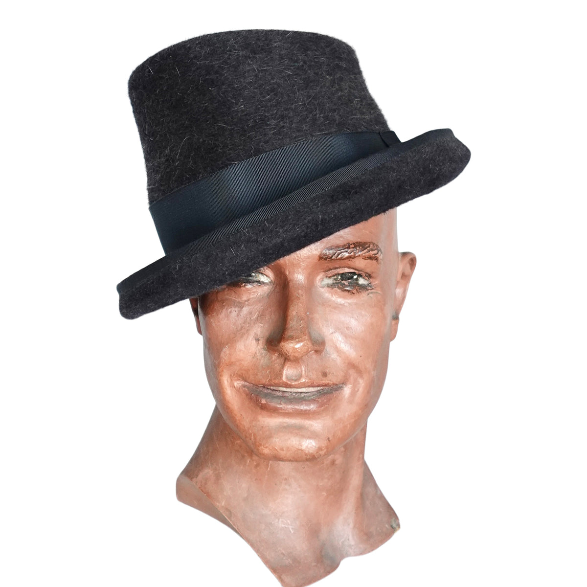 a mannequin head with a hat