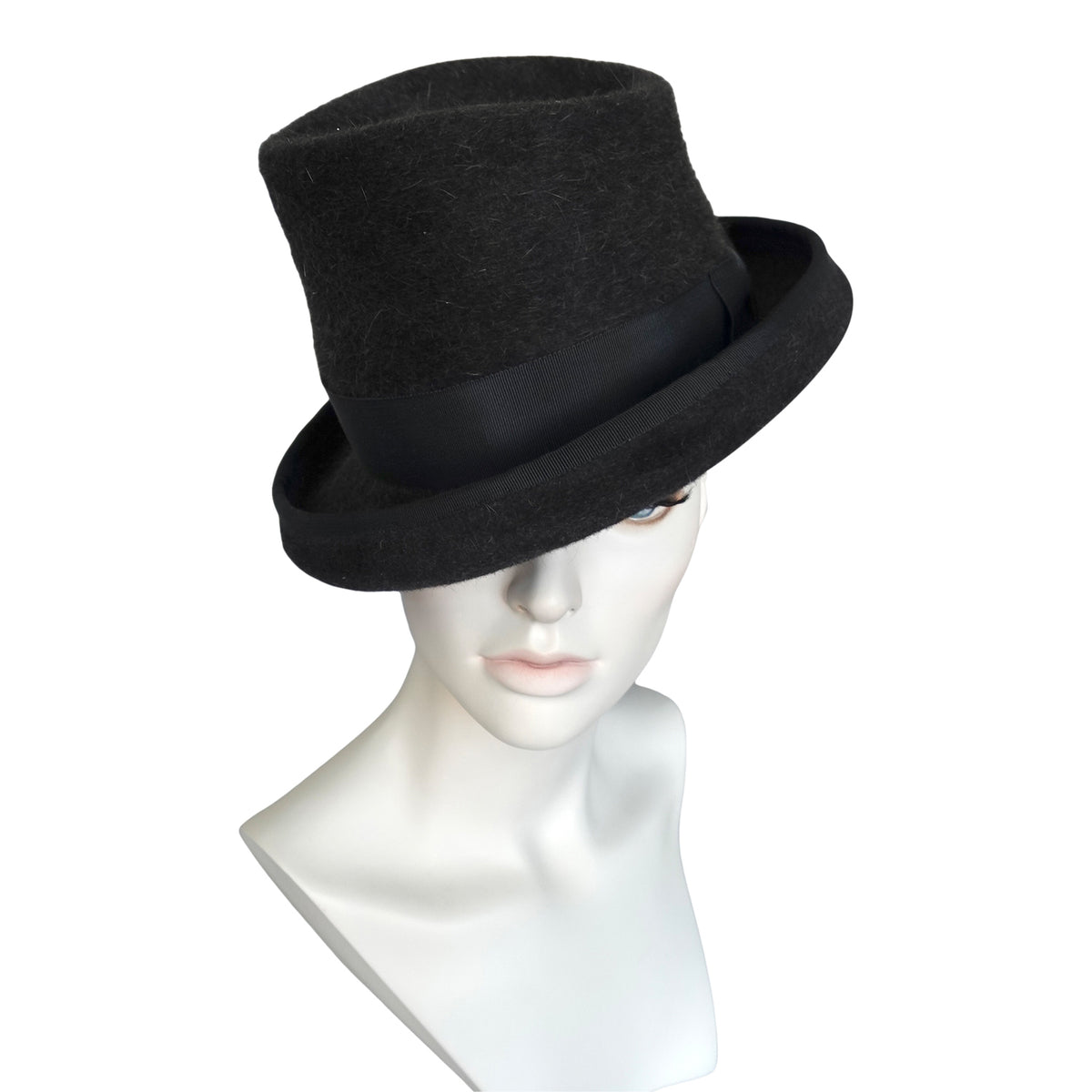 a mannequin with a black hat
