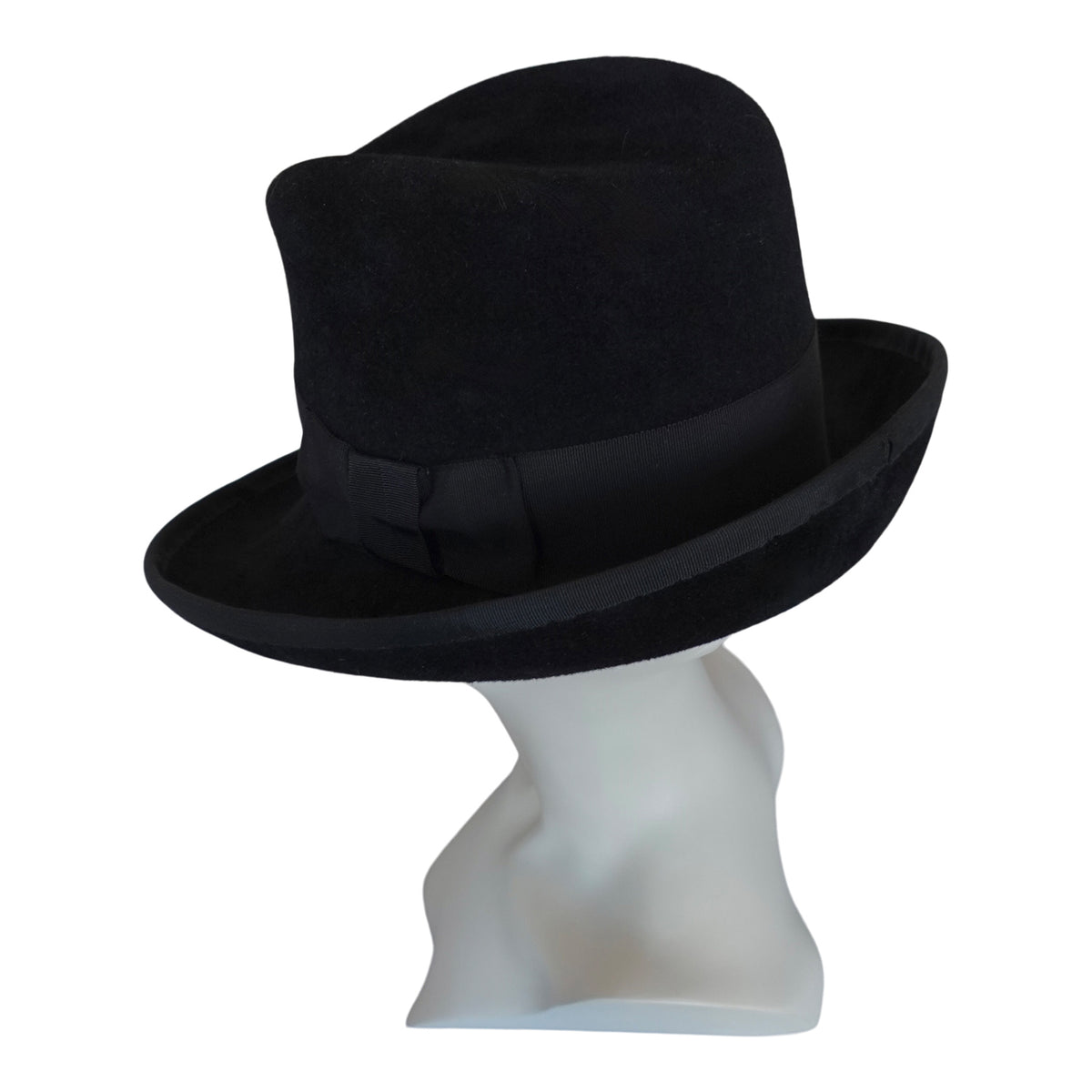 a black hat on a mannequin head